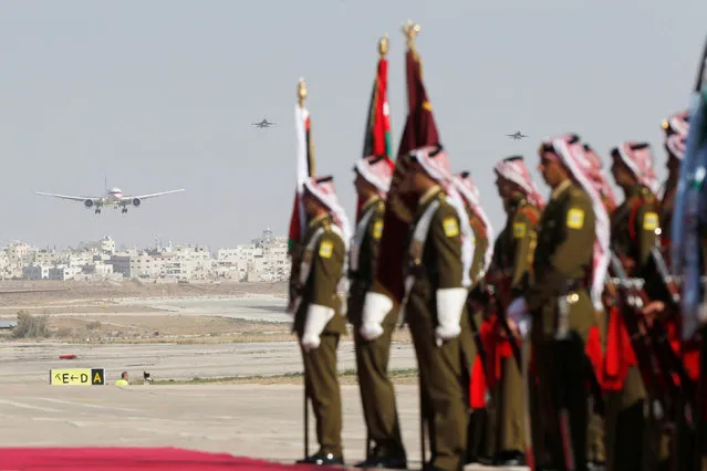 Abu Dhabi's Crown Prince Sheikh Mohammed bin Zayed al-Nahyan's plane is seen approaching for landing, as Jordanian honour guards stand at Amman military airport, Jordan, November 20, 2018. (Photo by Muhammad Hamed/Reuters)