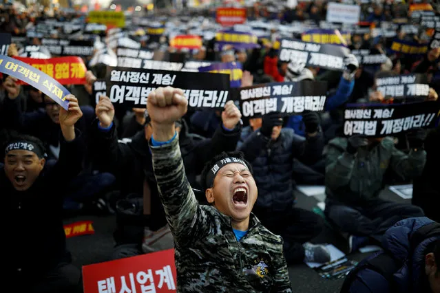 Taxi drivers take part in a protest against a carpool service application launched by Kakao Corp in Seoul, South Korea, December 20, 2018. (Photo by Kim Hong-Ji/Reuters)