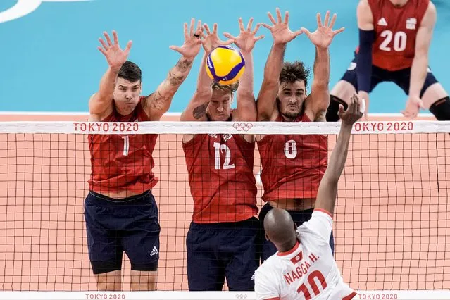 Tunisia's Hamza Nagga spikes the ball during a men's volleyball preliminary round pool B match between United States and Tunisia at the 2020 Summer Olympics, Wednesday, July 28, 2021, in Tokyo, Japan. (Photo by Manu Fernandez/AP Photo)