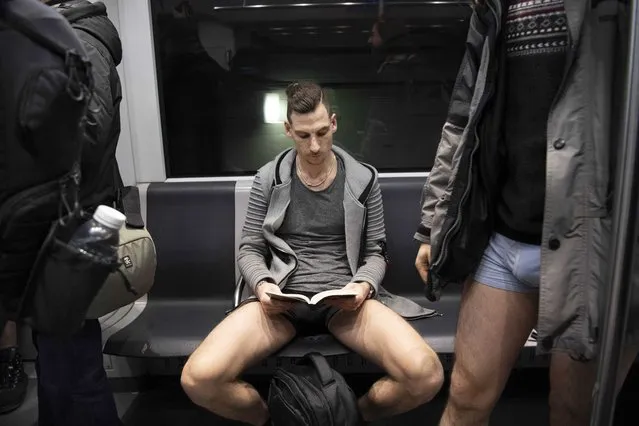 Passengers wear no trousers during the No Pants Subway Ride in Amsterdam, The Netherlands, 13 January 2019. (Photo by Olaf Kraak/EPA/EFE/Rex Features/Shutterstock)