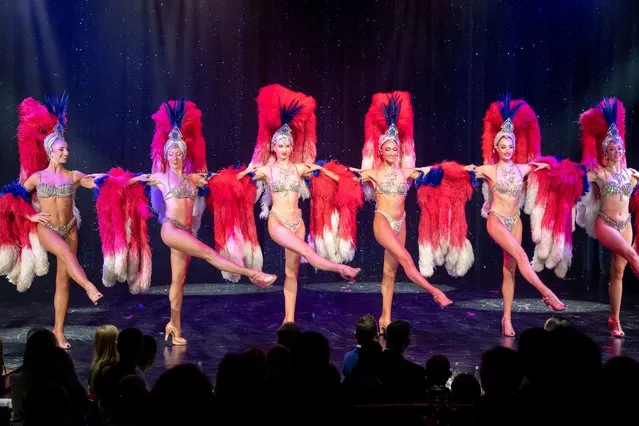 Dancers perform on stage at Le Lido on September 16, 2021 in Paris, France. Paris' world-famous cabaret venue Le Lido, celebrating their 75th anniversary has been closed due to the Covid-19 pandemic. The dancers perform again in the show “Paris Merveilles” produced and directed by Franco Dragone. Over 1100 guests can attend the show. (Photo by Kristy Sparow/Getty Images )