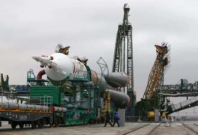 The Soyuz TMA-20M for the next International Space Station (ISS) crew of Jeff Williams of the U.S. and Oleg Skriprochka and Alexey Ovchinin of Russia is transported from an assembling hangar to the launchpad, ahead of its launch scheduled on March 19, at the Baikonur cosmodrome in Kazakhstan March 16, 2016. (Photo by Shamil Zhumatov/Reuters)