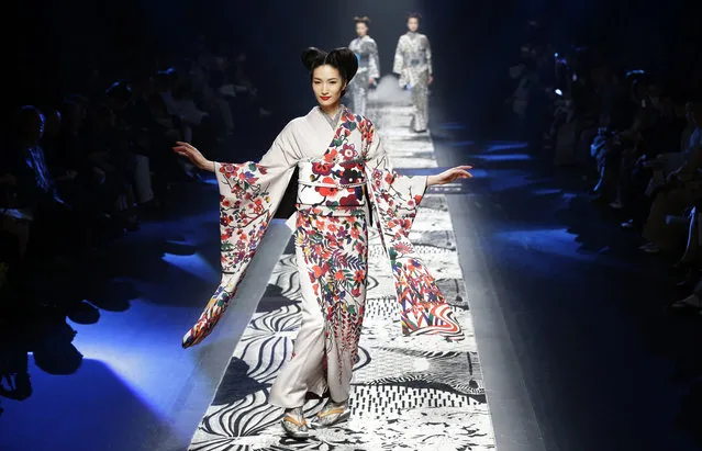 A model displays a creation by Japanese designer Jotaro Saito during the 2016 Autumn/Winter Collection at the Tokyo Fashion Week in Tokyo, Wednesday, March 16, 2016. (Photo by Shizuo Kambayashi/AP Photo)