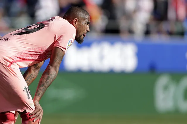 Barcelona's Kevin-Prince Boateng looks on at the end of the Spanish La Liga soccer match between Huesca and Barcelona at the Alcoraz stadium in Huesca, Saturday, April 13, 2019. The match ended in a 0-0 draw. (Photo by Manu Fernandez/AP Photo)