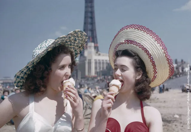 Two girls enjoy ice creams on the sands, 1958)