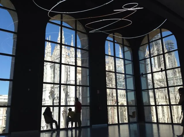 “Duomo of Milan from Novecento Modern Art Museum”. Patrons of Milan's Novecento Modern Art Museum admiring the city's Gothic cathedral. Taken with an iPhone. (Photo and caption by Kathryn Schipper/National Geographic Traveler Photo Contest)
