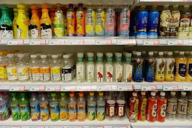 Empty bottles of soft drinks are seen at Xuzhen Supermarket in Shanghai, China, April 13, 2016. According to local media, the Xuzhen Supermarket with the slogan “fill the void” selling only empty packages of products, opened on April 8 in Shanghai's Changning District, which was the first time this conceptual art project being taken into a real neighborhood in a city. The project was debuted in 2007 and were on show in several museums around the world. (Photo by /Reuters)