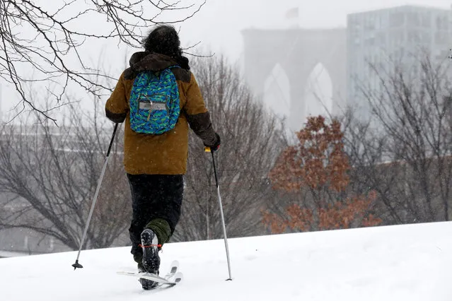 A man skis during a snow storm in Brooklyn, New York City, U.S., March 14, 2017. (Photo by Brendan McDermid/Reuters)