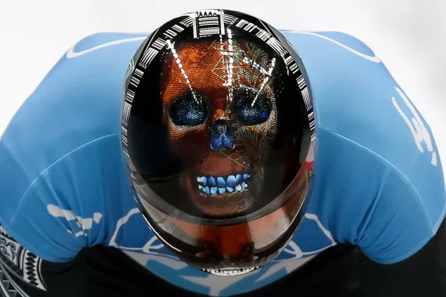 Nathan Crumpton of American Samoa competes in the men's skeleton event at the 2022 Winter Olympics at the Yanqing National Sliding Centre in Beijing, China on February 11, 2022. (Photo by Anton Novoderezhkin/TASS)