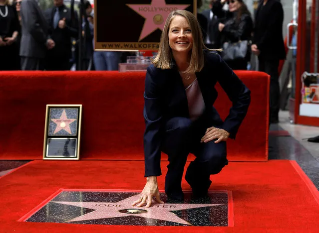 Actress Jodie Foster touches her star after it was unveiled on the Hollywood Walk of Fame in Hollywood, U.S., May 4, 2016. (Photo by Mario Anzuoni/Reuters)