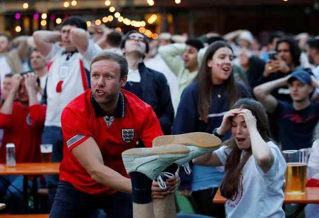 England fans react during the Euro 2020 match against Ukraine in Vinegar Yard, London, Britain, July 3, 2021. (Photo by Andrew Boyers/Action Images via Reuters)