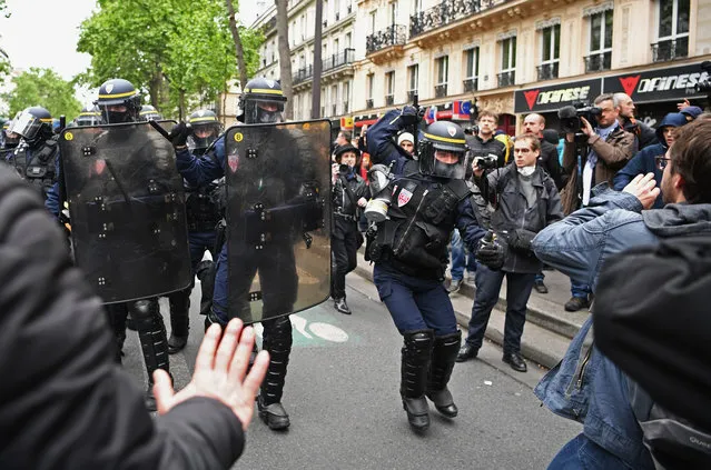 Police control demonstrators on a trade unions demonstrations against the election of Emmanuel Marcon on May 8, 2017 in Paris, France. The centrist candidate Mr Marcon defeated far right candidate Marine le Pen in yesterday's run off for the French presidency. (Photo by Jeff J. Mitchell/Getty Images)