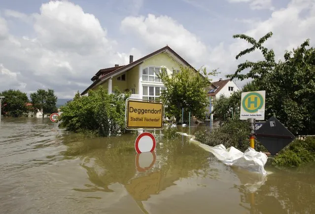 The village of Fischerdorf, near Deggendorf, is flooded, June 7, 2013. REUTERS/Michaela Rehle