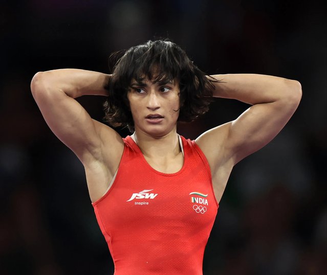 Vinesh Vinesh of Team India reacts during the Women's Freestyle 50kg 1/4 Final match between Vinesh Vinesh of Team India and Oksana Livach of Team Ukraine on day eleven of the Olympic Games Paris 2024 at Champs-de-Mars Arena on August 06, 2024 in Paris, France. (Photo by Luke Hales/Getty Images)