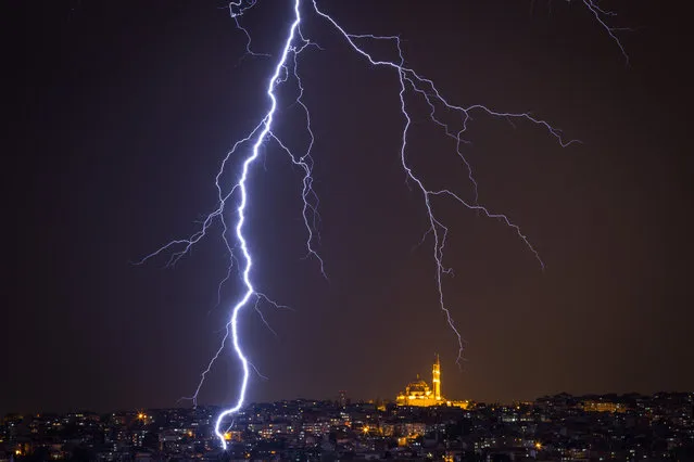 Fatih Mosque is seen as lightning strikes over the Istanbul skyline during a thunderstorm on May 7, 2017 in Istanbul, Turkey. (Photo by Chris McGrath/Getty Images)
