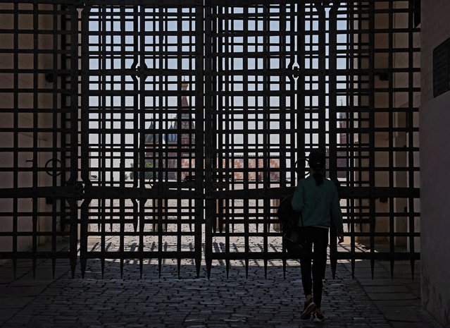 A woman walks near the closed Red Square in Moscow, Russia on June 25, 2023. (Photo by Evgenia Novozhenina/Reuters)