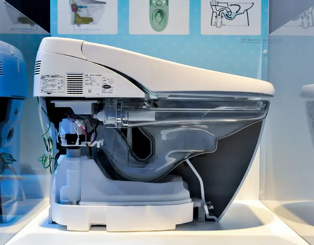 A cross section of moden toilet is displayed during the “Toilet!? Human Waste and Earth's Future” exhibition at The National Museum of Emerging Science and Innovation – Miraikan on July 1, 2014 in Tokyo, Japan. The exhibition focuses on how the toilet has changed our daily lives and discovers what the most environment-friendly and ideal toilet is. (Photo by Keith Tsuji/Getty Images)
