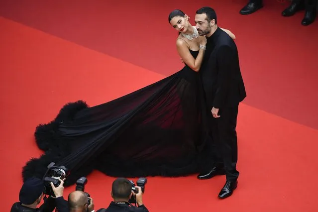 Portuguese model Sara Sampaio and Saudi film producer Mohammed al-Turki arrive for the screening of the film “Forever Young (Les Amandiers)” at the 75th edition of the Cannes Film Festival in Cannes, southern France, on May 22, 2022. (Photo by Piroschka Van De Wouw/Reuters)