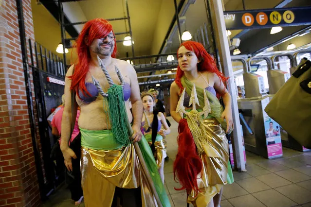 Participants of the Mermaid Parade arrive in a subway station in Brooklyn, New York June 18, 2016. The annual parade, founded in 1983, seeks to bring mythology to life for residents, create confidence in the district and to allow artistic self-expression in public, according to the parade's website. (Photo by Eduardo Munoz/Reuters)