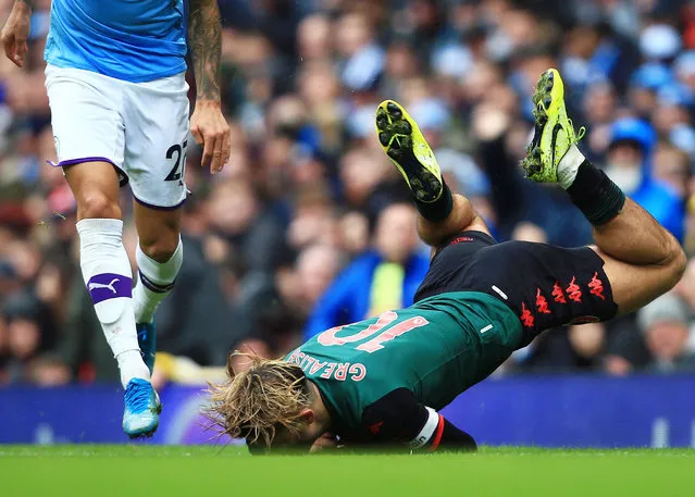 Jack Grealish of Aston Villa hits the ground at the Etihad as Manchester City scored three second-half goals to overcome the visitors at Etihad Stadium in Manchester, England on October 26, 2019. (Photo by Matt West/BPI/Rex Features/Shutterstock)