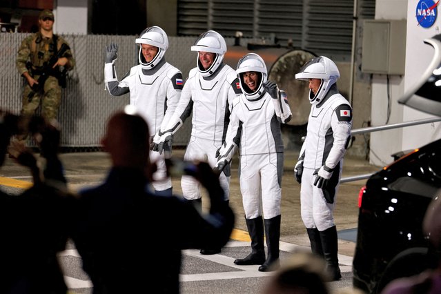 NASA astronaut Jasmin Moghbeli, European Space Agency astronaut Andreas Mogensen, JAXA (Japan Aerospace Exploration Agency) astronaut Satoshi Furukawa, and Roscosmos cosmonaut Konstantin Borisov depart their crew quarters for the launch pad before their mission to the International Space Station as Crew-7 on the SpaceX Crew Dragon spacecraft at Cape Canaveral, Florida, U.S. August 25, 2023. (Photo by Joe Skipper/Reuters)