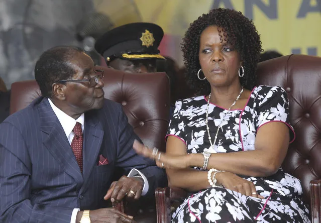 In this Saturday February 27, 2016 file photo, Zimbabwe President Robert Mugabe, left, and his wife Grace attend his birthday celebrations in Masvingo, Zimbabwe. President Robert Mugabe is in South Africa as his wife is accused of assaulting a young model. (Photo by Tsvangirayi Mukwazhi/AP Photo)