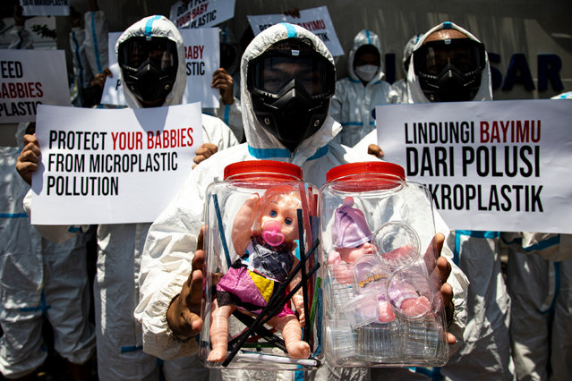 Ecological Observation and Wetland Conservation Indonesia activists gather in protest to demand the withdrawal of products containing plastic microbeads in front of the National Agency of Drug and Food Control office on November 07, 2024 in Surabaya, Indonesia. Activists from Ecological Observation and Wetland Conservation Indonesia (Ecoton) are urging the National Agency of Drug and Food Control to withdraw products containing microbeads from the market and implement strict oversight on their use in cosmetics and baby care items. A study conducted by Ecoton from September to November 2024 revealed that 58% of the 83 baby care products tested contained microbeads, which pose health risks as they can enter the body through the skin; one product was found to have ten different types of microbeads, highlighting the potential dangers these substances present to the environment and the health of vulnerable infants. (Photo by Robertus Pudyanto/Getty Images)