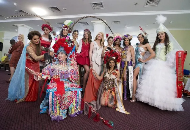 Participants pose for a photo as they wait backstage before the “Mrs Universe 2015” contest in Minsk, Belarus, August 29, 2015. (Photo by Vasily Fedosenko/Reuters)