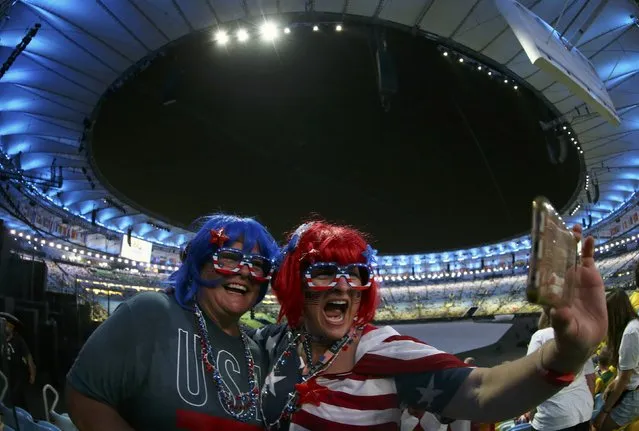 2016 Rio Olympics, Opening ceremony, Maracana, Rio de Janeiro, Brazil on August 5, 2016. American fans take a selfie before the start of the opening ceremony. (Photo by Jeremy Lee/Reuters)