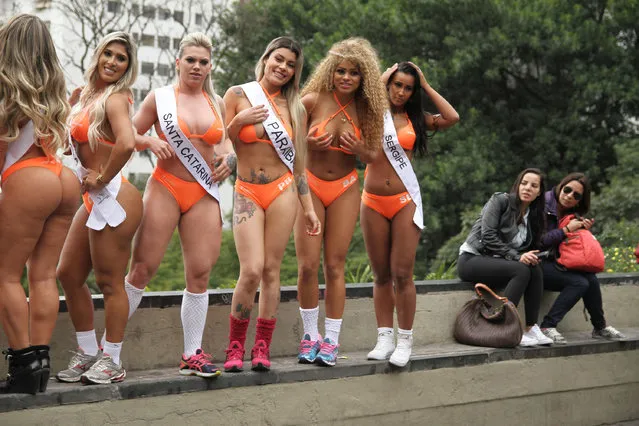 The 27 curvy candidates for this year's eagerly-awaited Miss Bumbum pageant showed off all their assets as they paraded on one of Sao Paulo's busiest streets – Avenida Paulista – for the launch promotional race on August 8, 2016. (Photo by Leo Marinho/Splash News and Pictures)