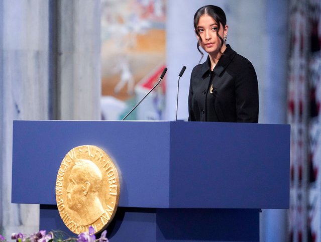 Kiana Rahmani, daughter to 2023 Nobel Peace Prize laureate Narges Mohammadi, speaks on stage during the 2023 Nobel Peace Prize ceremony at the Oslo City Hall on December 10, 2023. 2023 Nobel Peace Prize winner Narges Mohammadi is imprisoned and is therefore represented by her 17-year-old twin children with their father, who live in exile in Paris. Mohammadi receives the peace prize for her fight against the oppression of women in Iran and the fight for human rights and freedom for all. (Photo by Javad Parsa/NTB via AFP Photo)