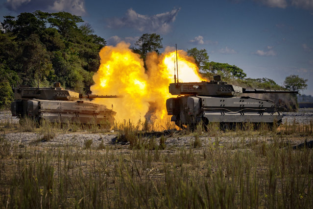 Philippine Army troops fire rounds from Sabrah light tanks as they take part in a live fire exercise as part of CATEX (Combined Arms Training Exercise) on March 07, 2025 in Tarlac, Luzon, Philippines. Philippine Defense Secretary Gilberto Teodoro Jr. affirmed confidence in U.S.-Philippines ties despite President Trump’s shifting foreign policy, citing their shared opposition to China and the restoration of $400 million in U.S. military aid. As concerns linger over a potential U.S. withdrawal from the South China Sea, Manila has expanded defense ties with Japan and New Zealand and increased its military budget. (Photo by Ezra Acayan/Getty Images)