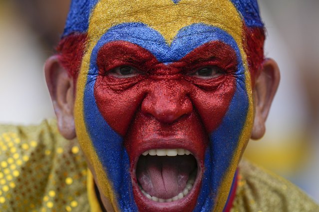 A Colombia fan cheers before the start of the World Cup 2026 qualifying soccer match against Paraguay at Metropolitano Stadium in Barranquilla, Colombia, Tuesday, March 25, 2025. (Photo by Fernando Vergara/AP Photo)