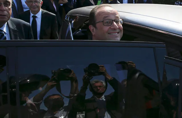 President François Hollande leaves after a visit to the Necotin primary school on the first day of the new school year in Orleans, France September 1, 2016. (Photo by Gonzalo Fuentes/Reuters)