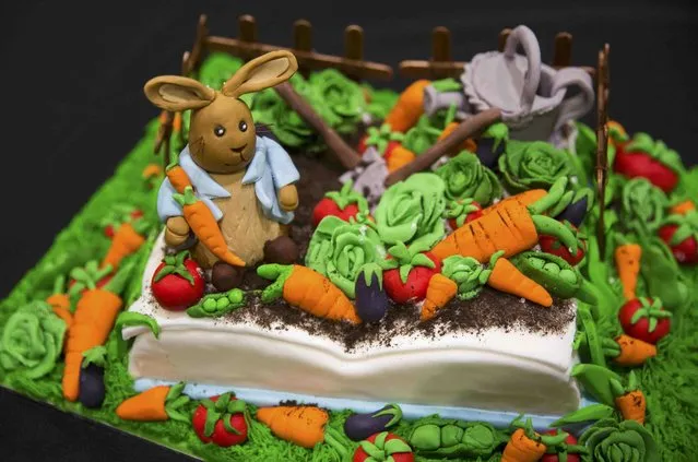 A cake decorated in the style of the Beatrix Potter's children's character "Peter Rabbit" is displayed at the Cake and Bake show in London, Britain October 3, 2015. (Photo by Neil Hall/Reuters)