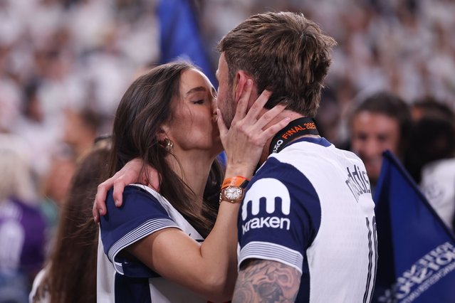 James Maddison of Tottenham Hotspur kisses his girlfriend Kennedy Alexa during the UEFA Europa League Final 2025 between Tottenham Hotspur and Manchester United at San Mames Stadium on May 21, 2025 in Bilbao, Spain. (Photo by Catherine Ivill - AMA/Getty Images)