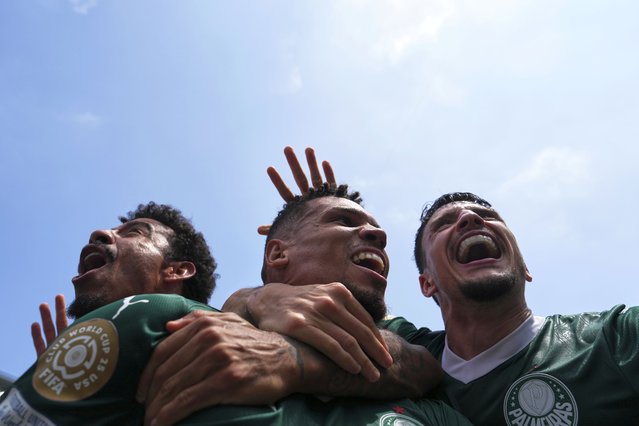 Palmeiras' Paulinho, center, celebrates with teammates after scoring the opening goal during the Club World Cup round of 16 soccer match between Palmeiras and Botafogo in Philadelphia, Saturday, June 28, 2025. (Photo by Matt Slocum/AP Photo)