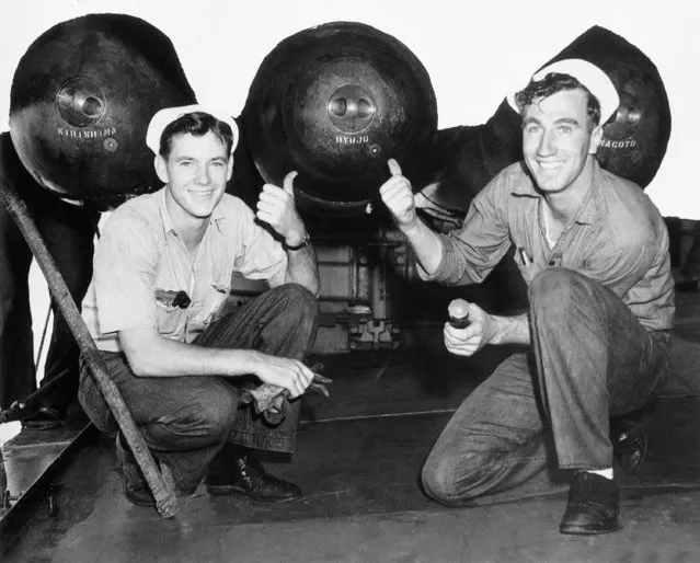Torpedoes and depth charges carried by destroyers of the United States fleet, display a personal touch these days. These torpedo warheads carry the names of Japanese aircraft carries and battleships shown February 3, 1942. (Photo by AP Photo)