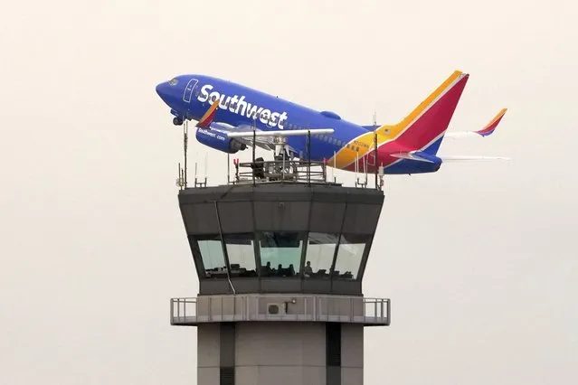 A Southwest Airlines passenger jet takes off from Chicago's Midway Airport as flight delays stemming from a computer outage at the Federal Aviation Administration brought departures to a standstill across the U.S earlier Wednesday, January 11, 2023, in Chicago. (Photo by Charles Rex Arbogast/AP Photo)