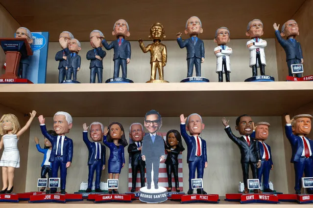 A newly designed bobblehead cutout of recently elected Republican congressman from New York, George Santos (C-bottom), is displayed at the National Bobblehead Hall of Fame and Museum on January 25, 2023, in Milwaukee, Wisconsin. Two versions of bobbleheads, standard and with elongated nose, are scheduled for production and will be available for purchase. (Photo by Kamil Krzaczynski/AFP Photo)