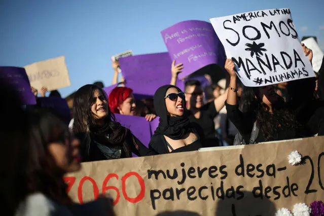 Activists take part  in a march to protest violence against women and the murder of a 16-year-old girl in a coastal town of Argentina last week, at Revolucion monument, in Mexico City, Mexico, October 19, 2016. (Photo by Edgard Garrido/Reuters)