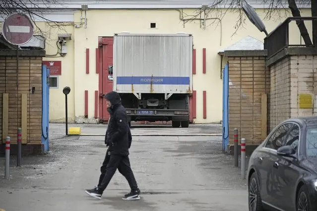 A man walks past an entrance of the Lefortovo prison, in Moscow, Russia, Thursday, March 30, 2023. Russia's top security agency says an American reporter for the Wall Street Journal has been arrested on espionage charges. The Federal Security Service said Thursday that Evan Gershkovich was detained in the Ural Mountains city of Yekaterinburg while allegedly trying to obtain classified information. (Photo by Alexander Zemlianichenko/AP Photo)