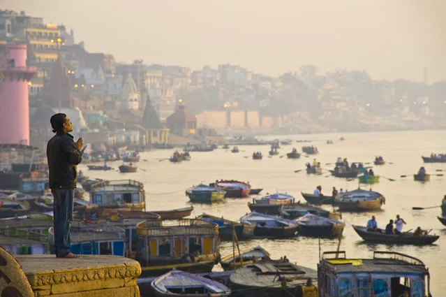 “Morning at Varanasi”. The Ganges is the most sacred river, while Varanasi is regarded as the holy city to Hindus. Everyday from dawn to dusk, people comes here to pray. (Photo and caption by Ng Hock How/National Geographic Traveler Photo Contest)