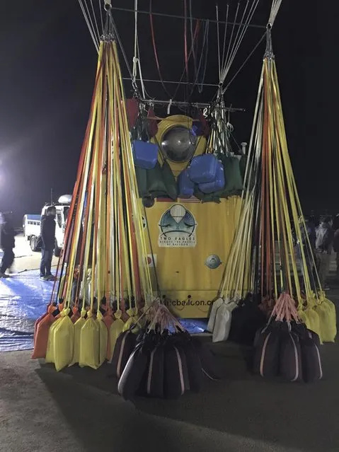 The Two Eagles balloon capsule is readied for flight in an attempt to cross the Pacific by balloon and set a new world record for distance and duration record for gas balloon travel, in Saga, Saga Prefecture, January 25, 2015, in this handout photo courtesy of Tamara Bradley of the Two Eagles Balloon Team. (Photo by Tamara Bradley/Reuters/Two Eagles Balloon Team)