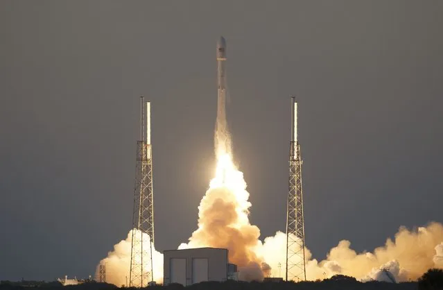 The unmanned Falcon 9 rocket, launched by SpaceX and carrying NOAA's Deep Space Climate Observatory Satellite, lifts off from launch pad 40 at the Cape Canaveral Air Force Station in Cape Canaveral, Florida February 11, 2015. (Photo by Scott Audette/Reuters)