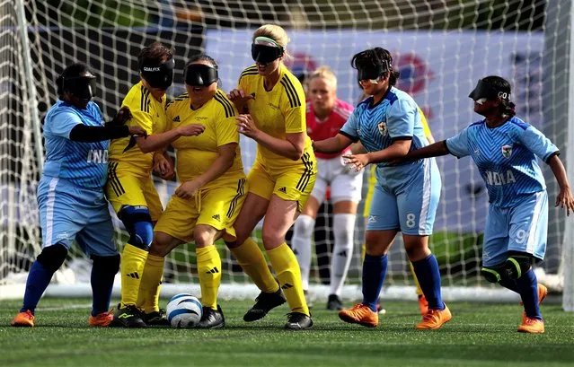 General view of the action between Sweden and India during the women's blind football at the IBSA World Games in Birmingham, Britain on August 21, 2023. (Photo by Lee Smith/Reuters)