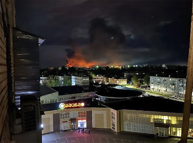 This image made from a social media and and provided by Ostorozhno Novosti shows smoke billowing over the city and a large blaze in Pskov, Russia, on August 29, 2023. Russian officials accused Ukraine of targeting six Russian regions early Wednesday in what appeared to be the biggest drone attack on Russian soil since Moscow sent troops into Ukraine 18 months ago. (Photo by Ostorozhno Novosti via AP Photo)