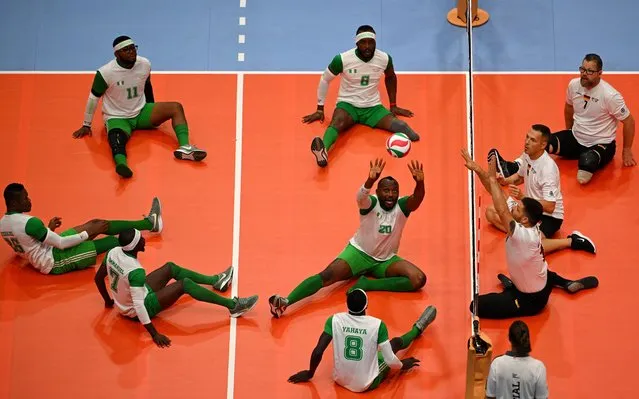 Thomas Ameh of Team Nigeria plays a shot in the Mixed Team Preliminary Round Sitting Volleyball match between Team Germany and Team Nigeria during day five of the Invictus Games Düsseldorf 2023 on September 14, 2023 in Duesseldorf, Germany. (Photo by Lukas Schulze/Getty Images for Invictus Games Düsseldorf 2023)