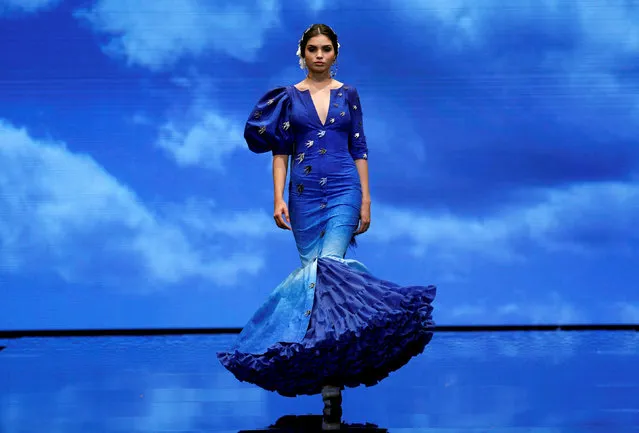 A model presents a creation by Ana Moron during the International Flamenco Fashion Show SIMOF in the Andalusian capital of Seville, Spain February 8, 2019. (Photo by Marcelo del Pozo/Reuters)