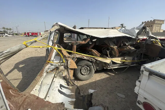 The bus that crashed today while carrying pilgrims to Karbala is pictured at the police station in Balad, Iraq, Saturday September 2, 2023. A bus carrying pilgrims to the Iraqi city of Karbala overturned north of Baghdad on Saturday, killing 18 people, medical officials said. (Photo by Ali Jabar/AP Photo)